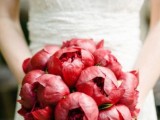a bright coral peony wedding bouquet is a bold solution for a summer or summer to fall wedding, a bold touch of color