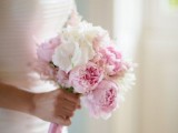 a simple and pretty wedding bouquet of white and pink peonies is a lovely idea for a summer or spring wedding, and you can DIY it