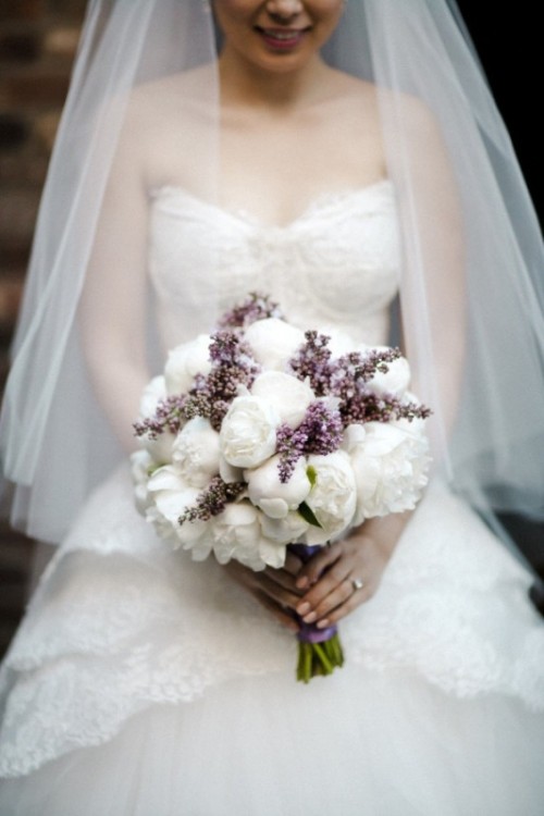 a lovely wedding bouquet of white peonies and lilac is a heavenly beautiful idea for a spring wedding