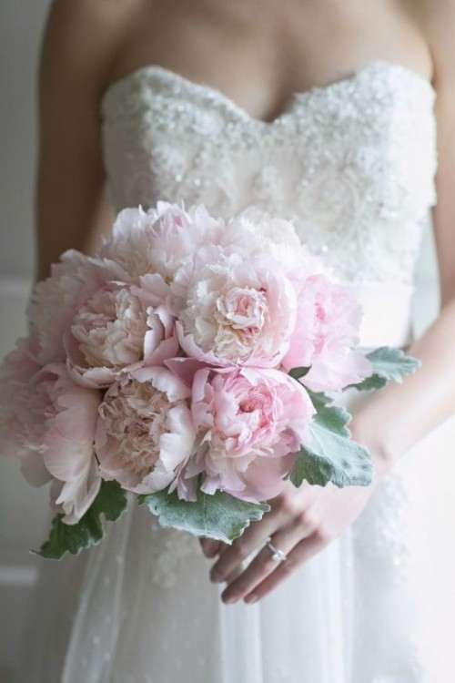 a pale pink peony wedding bouquet with pale foliage is a lovely and chic pastel spring wedding idea
