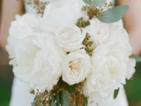 a romantic white peony wedding bouquet with eucalyptus is a pretty and chic idea for a spring or summer wedding