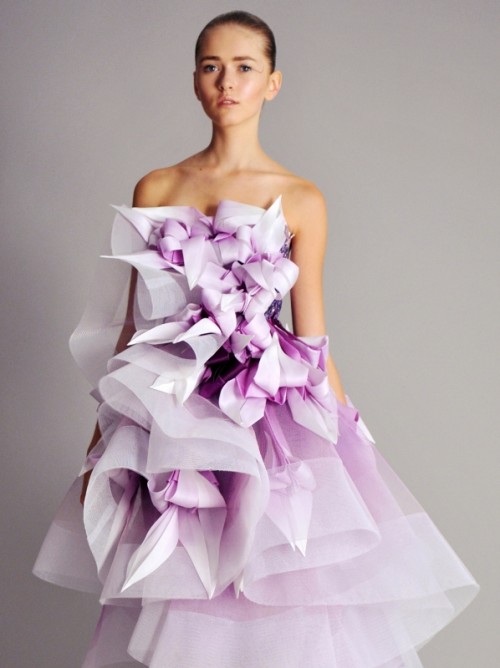 a strapless purple and white ruffled wedding dress like this one will make a bold statement at the wedding