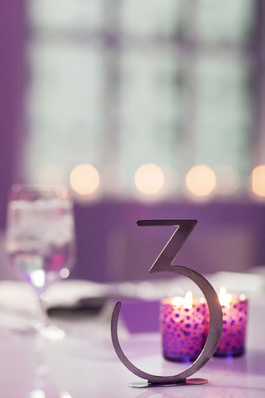 Radiant orchid candleholders and metallic decor will be amazing for decorating any wedding space in bright colors