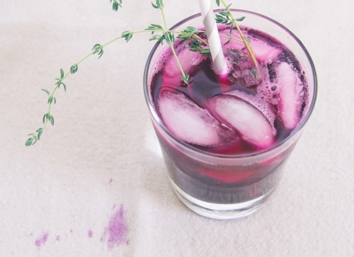 radiant orchid lemonade with fresh herbs is a cool signature drink idea for a bright wedding