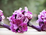 bold radiant orchid and hot pink bouquets with purple wraps and embellished brooches are amazing for a wedding