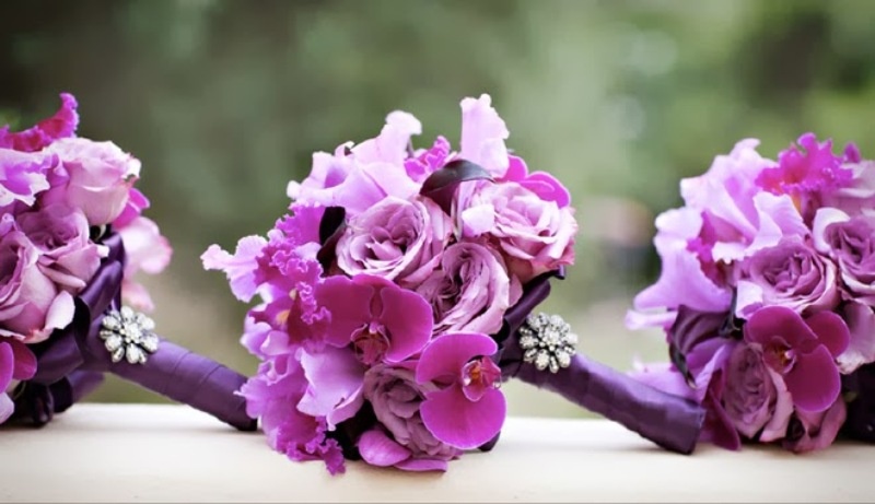 Bold radiant orchid and hot pink bouquets with purple wraps and embellished brooches are amazing for a wedding