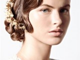 a side updo on medium hair done with a wavy front and a gold hairpiece looks really cool and wow