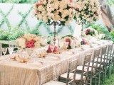 oversized floral topiaries and centerpieces make the tables very chic