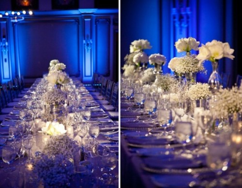 formal long wedding tables with baby's breath, white roses and candles