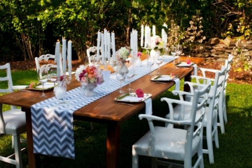 a grey and white chevron table runner is a classic idea to add pattern to the space and bring a slight retro feel