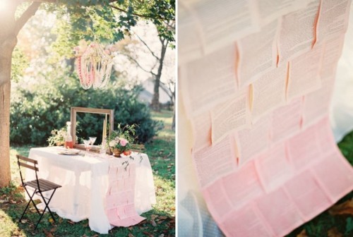 an ombre pink book page table runner is a very creative and romantic idea for a book-loving wedding