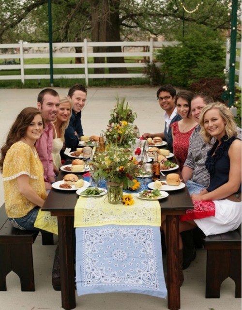 a blue and yellow floral table runner is a nice way to add color and pattern to the space