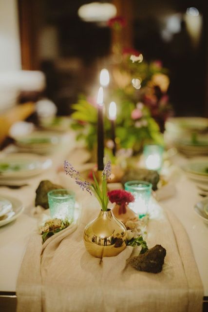 go for delicate and relaxed wedding reception decor - with wildflowers, candles, rocks and geodes