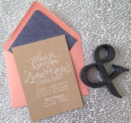 A fun rehearsal dinner invitation of cardboard, a coral envelope with blue lining is a simple and cute idea