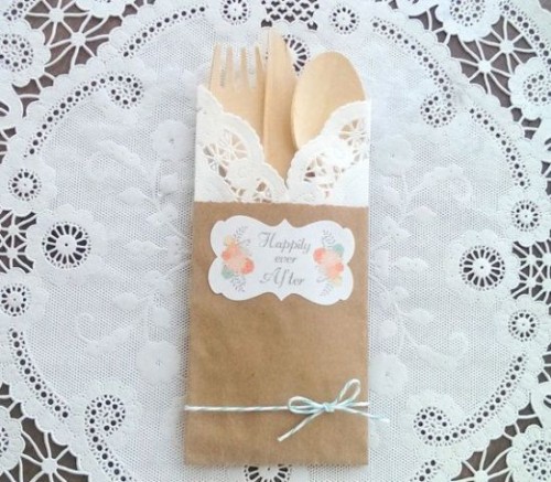 cardboard and craft paper bags with wooden cutlery for a rustic wedding or rehearsal