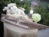 style your rehearsal dinner with wood, candle lanterns and hydrangeas