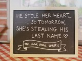 a framed chalkboard sign is a cool idea for decorating a rustic space