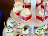 a simple and elegant thin metal tiered dessert stand is a timeless and neutral idea to rock at any wedding and it will fit many wedding styles and themes