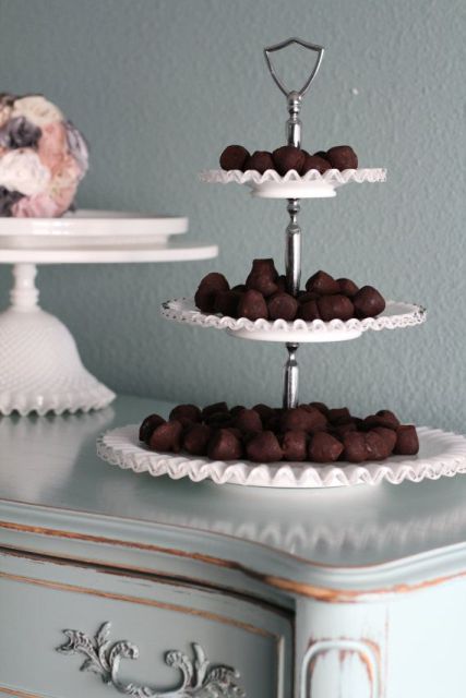 a delicate white tiered sweets stand will do for many desserts and will fit many wedding types, styles and themes