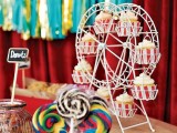 a cupcake stand shaped as a ferris wheel is a gorgeous idea for a fun and whimsical wedding