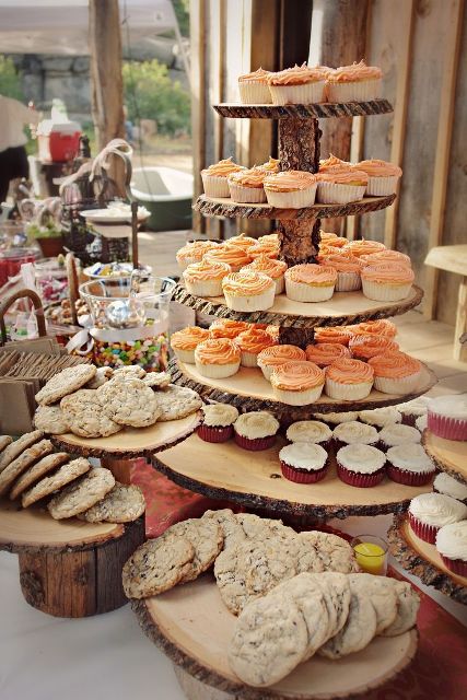 a rustic or woodland wedding dessert stand of wood slices and branches is a lovely idea for a wedding, you can easily make it