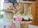 a woodland wedding dessert stand of tree stumps and wood slices for cupcakes and cakes is a lovely piece to DIY any time