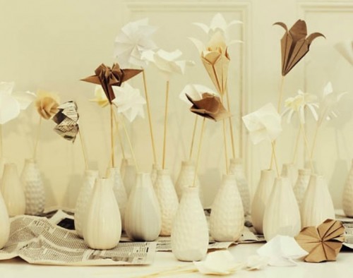 neutral vases with white and brown origami blooms are very affordable and easy to DIY centerpieces for a wedding