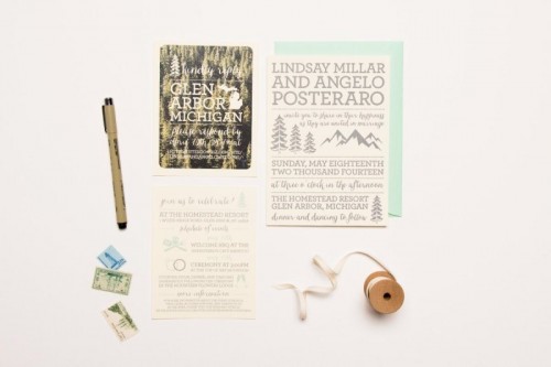 a stylish wedding invitation suite for a woodland wedding done in mint, grey and with woodland prints