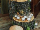 use tree stumps and candles for a woodland or rustic mountain wedding
