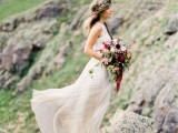 a gorgeous mountain bridal portrait with a wild fall-colored bouquet and a matching floral crown