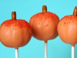 pumpkin-shaped mini cakies on sticks are amazing and fun fall wedding favors that everyone will enjoy