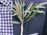 an olive groom boutonniere is a cool idea to spruce up your look with a bit of freshness but avoid any blooms