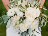 a neutral wedding bouquet with lush blooms, greenery and eucalyptus for a fresh and simple look