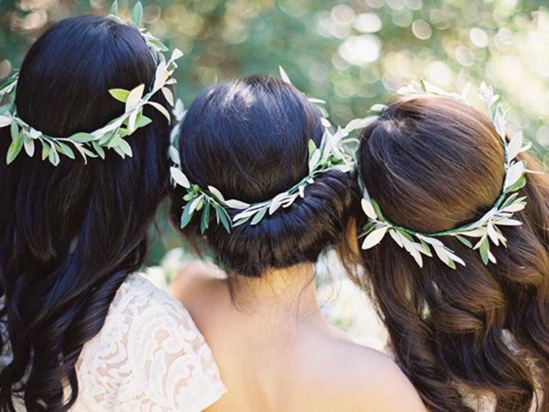 Bridesmaids' crowns of olive foliage are a cool and natural idea for a every wedding