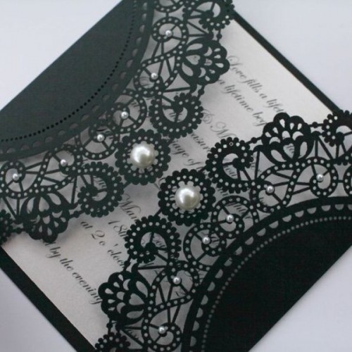 a super elegant black lace invitation with pearls is a cool idea for a bold statement at the wedding, it's pure lux