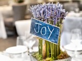 lavender in a metal box with a chalkboard sign ‘JOY’ is a cool idea for a rustic or industrial wedding