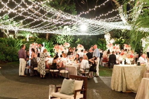 string lights forming canopies are a great solution to illuminate your destination wedding space, it's a very trendy idea