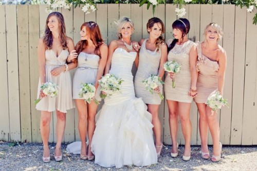 short mismatched blush and neutral bridesmaid dresses are nice for a spring or summer wedding