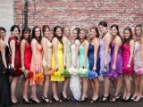 bright mismatching bridesmaid dresses in all the colors of rainbow for a colorful wedding in summer