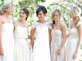 mismatched white bridesmaid dresses of various designs are chic and trendy, for spring and summer nuptials