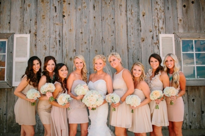 Mismatched short neutral and blush bridesmaid dresses will be a nice choice for almost any wedding