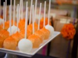 white and orange cake pops like these ones will be the best solution for a colorful summer or fall wedding