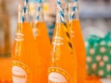 orange lemonade is a great signature drink for a bold and fun summer wedding