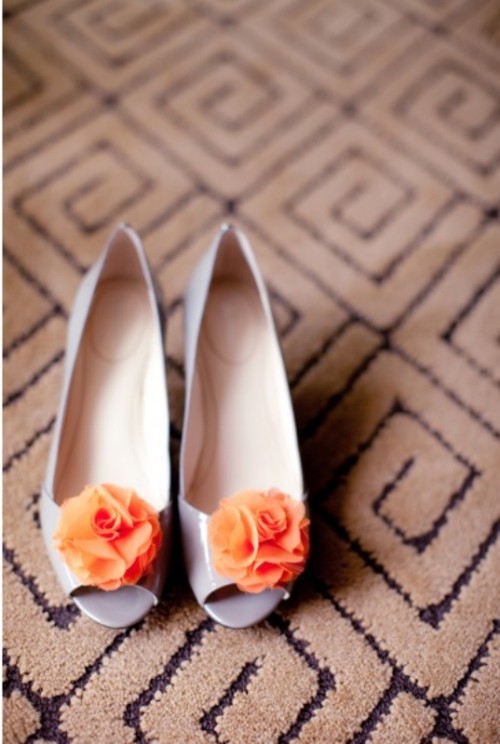 grey shoes with orange puffs are amazing for a catchy summer wedding