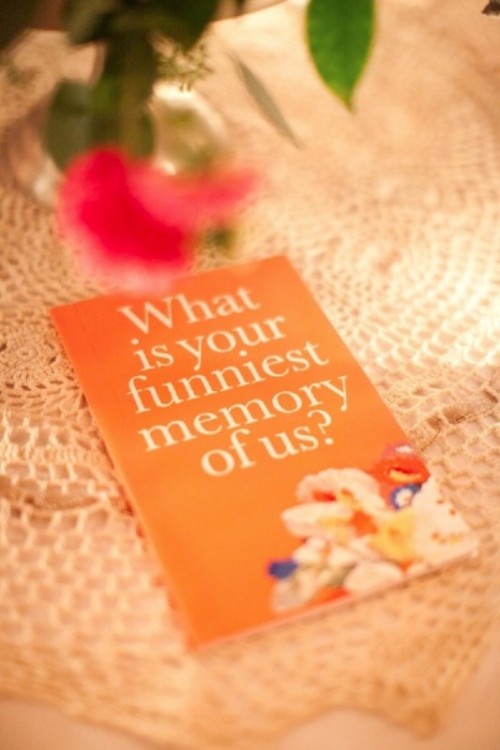 an orange card letting your guests to leave their memories about you as a couple