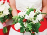 red and white striped bridesmaid dresses and green, white and red bouquets to rock at a winter or Christmas wedding