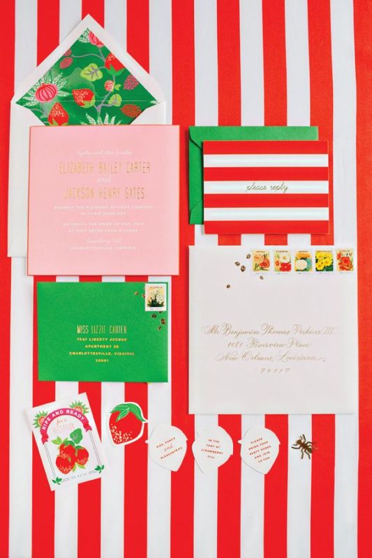 A bright green, red and white stationery suite with various patterns is a fun and bold idea to rock at a winter wedding