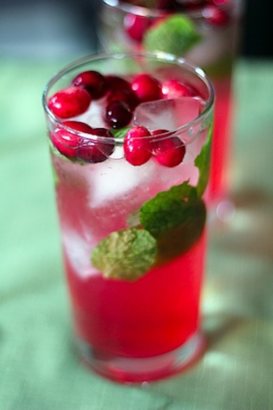 Cranberry punch with mint, berries and ice is an amazing refreshing drink for a winter or Christmas wedding
