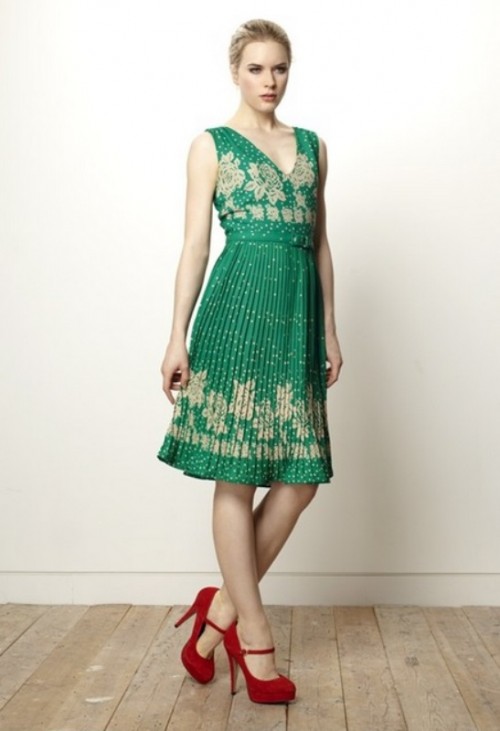 a green bridesmaid dress with gold embroidery and red shoes for a winter or Christmas wedding