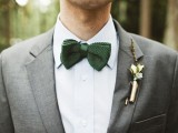 accessorize your look with a green bow tie and a pretty boutonniere for a winter wedding